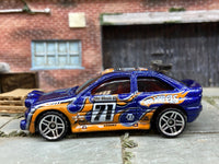 Loose Hot Wheels - Ford Escort Rally - Blue and Orange #71 Race Livery — view 3
