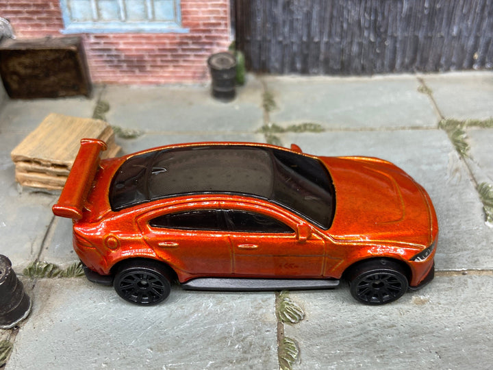 Loose Hot Wheels Jaguare XE SV Project 8 Dressed in Orange — view 2