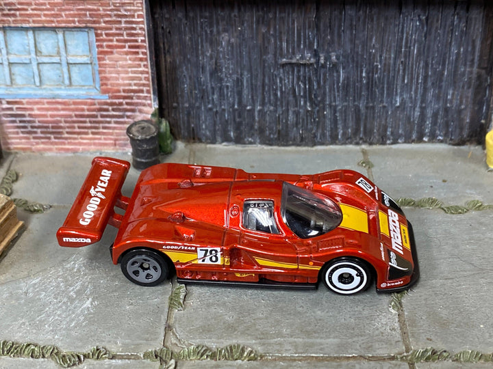 Loose Hot Wheels - Mazda 787B Race Car - Red and Yellow Goodyear — view 2