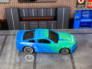 Loose Hot Wheels - 2007 Ford Mustang - FALKE TIRES Blue and Green — view 2