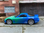 Loose Hot Wheels - 1995 Mazda RX-7 - Blue/Green Falken Tires