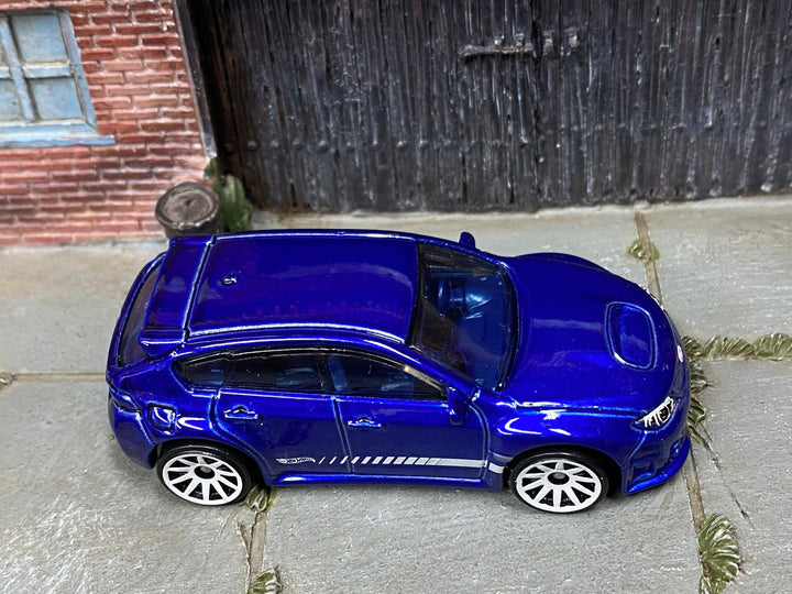 Loose Hot Wheels - Subaru WRX STI - Blue and White — view 2
