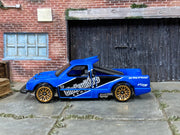 Loose Hot Wheels - Limited Grip Race Truck - Blue, Black and White — view 3