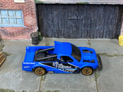Loose Hot Wheels - Limited Grip Race Truck - Blue, Black and White — view 2