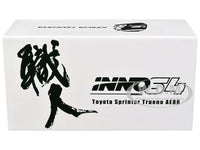INNO64 Toyota Sprinter Trueno AE86 number 15 Keiichi Tsuchiya white-and-green 1:64 model in acrylic display packaging, IN64-AE86-KT