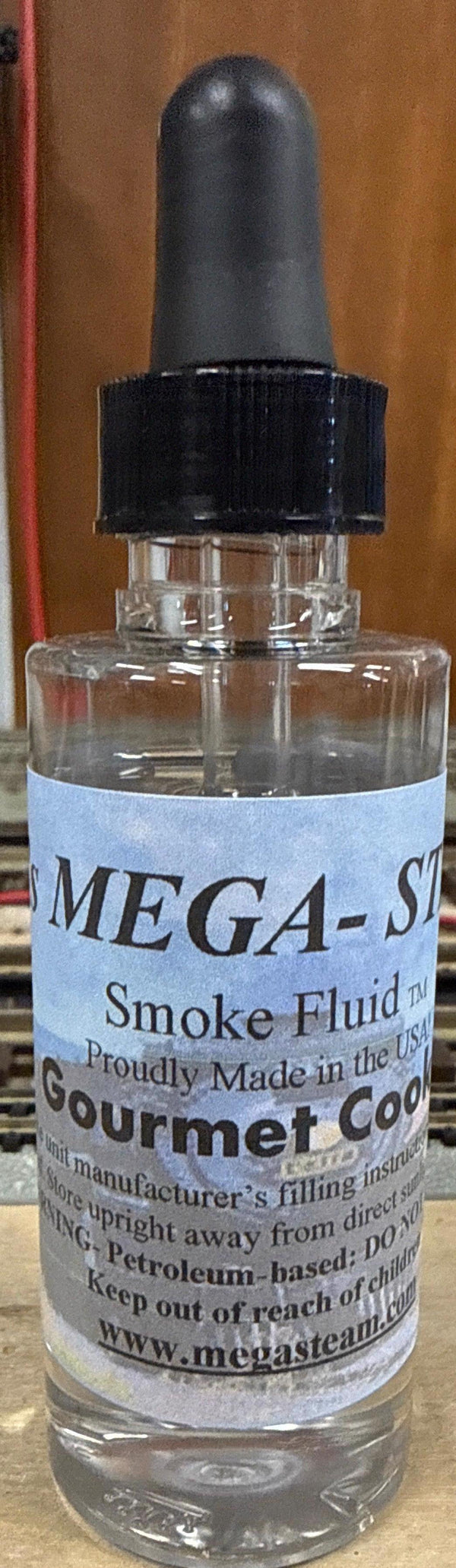JT's Mega-Steam Gourmet Cookie smoke fluid bottle with dropper
