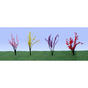 JTT 95545 flower bushes — pink, yellow, purple and red examples in a scenery setting