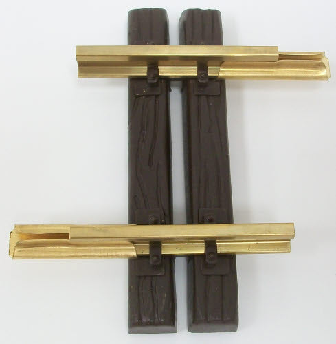 Single LGB 10050 52 mm straight track section with two dark ties and brass-colored rails.