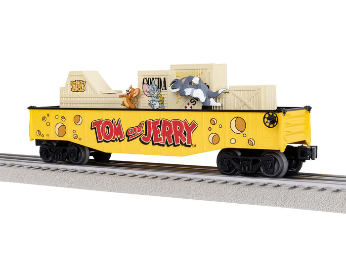 Lionel 2528520 Tom and Jerry chasing gondola, three-quarter view of yellow gondola with characters and cheese crates