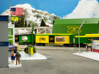 Lionel 2528630 John Deere Waterloo Boy reefer, yellow refrigerator car displayed on a layout; other trains and scenery not included