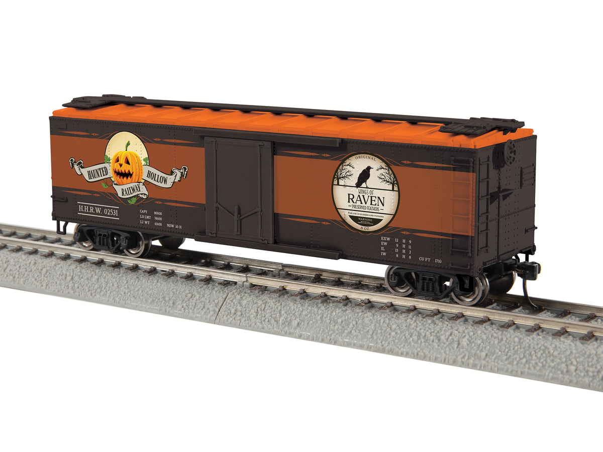 Lionel 2554560 HO Wings of Raven reefer with Haunted Hollow Railway Halloween decoration.