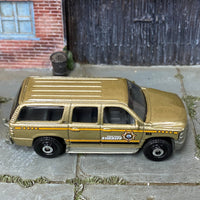 Loose Matchbox - 2000 Chevy Suburban - Gold Boone County Sheriff