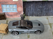 Matchbox 2015 Corvette Stingray Gray and White Trooper Highway Patrol loose diecast - side profile detail shot