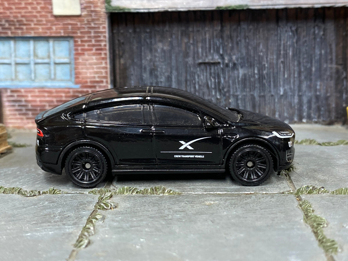 Matchbox Tesla Model X black SpaceX Crew Transport — right-side view