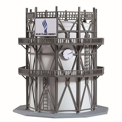 Model Power 1567 N scale large oil storage tank kit, manufacturer assembled example in gray with Blue Flame Energy sign, ladders and platforms.