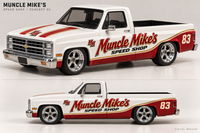 Visual mockup of Muncle Mike’s Speed Shop red and gold decals on a white 83 Silverado. Digital decal artwork only; truck not included.