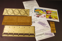 Monroe Models 2217 HO Double Billboard kit, unassembled parts, printed signs and instructions.