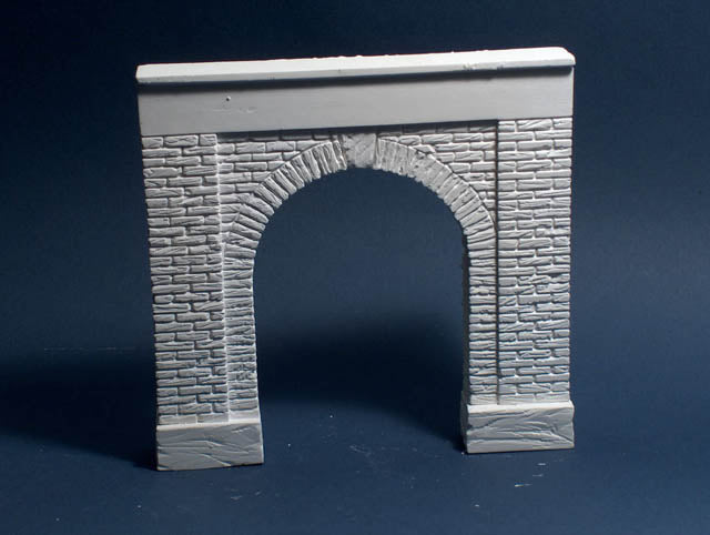 Monroe Models AIM 950 weathered-stone tunnel portal for On3, On30, S and Sn3 model railroads, manufacturer front view of one portal.