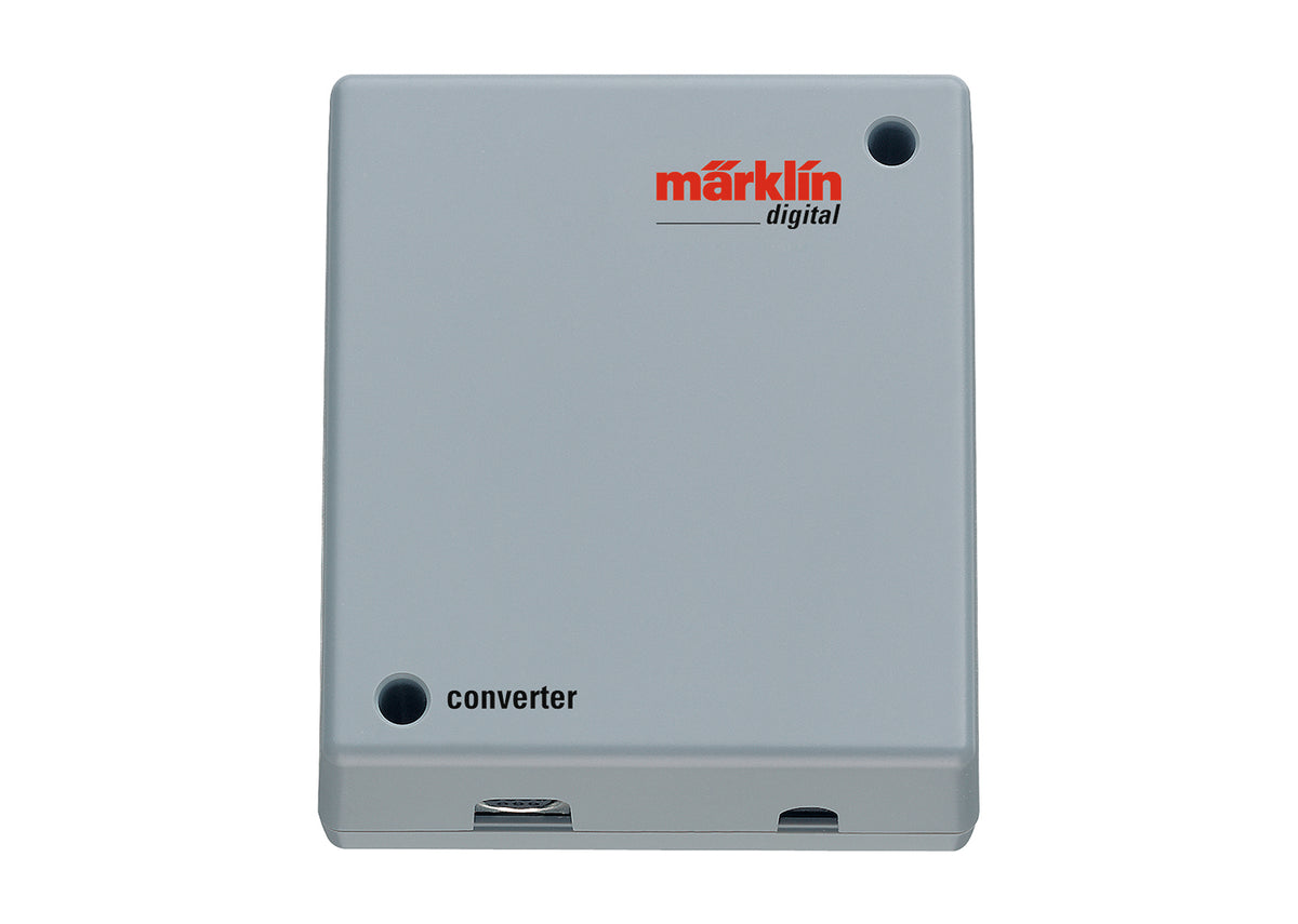 Märklin 60130 digital converter in gray housing.