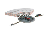 Märklin 89983 Z scale turntable in a manufacturer's example layout; locomotives, roundhouse, scenery and approach tracks are not included.