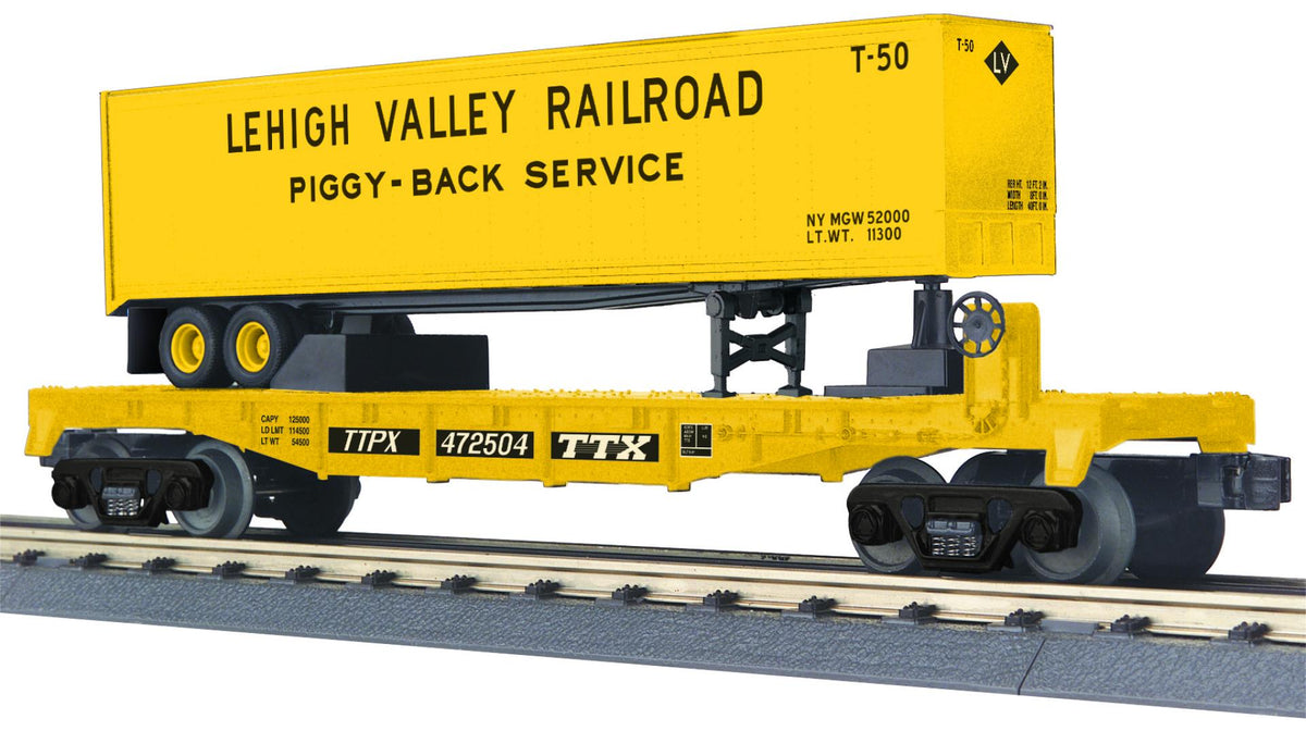 MTH 30-76960 O gauge TTX flat car carrying a yellow Lehigh Valley 40-foot trailer