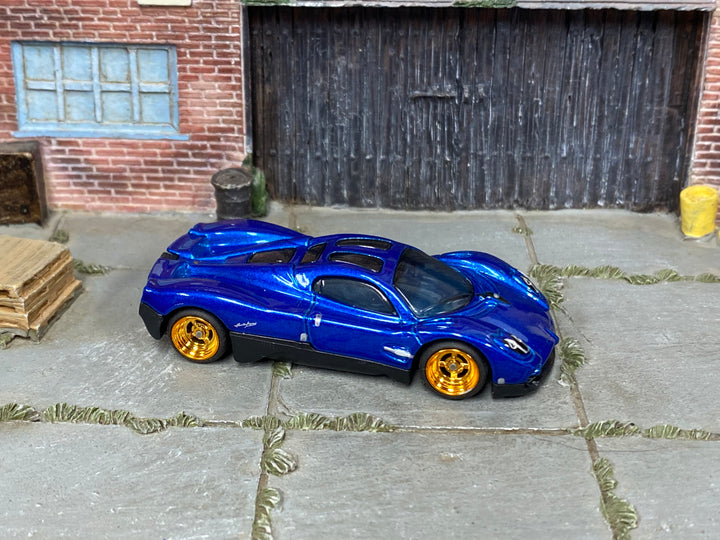 Pagani Zonda R custom Hot Wheels in metallic blue with gold wheels and rubber tires