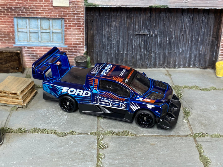 Ford Performance SuperVan 4 custom Hot Wheels in blue with black wheels and rubber tires