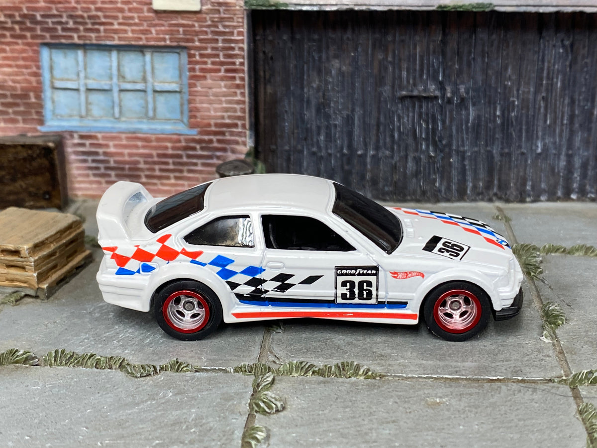 BMW E36 M3 Race custom Hot Wheels in white number 36 livery with red and chrome wheels and rubber tires