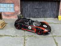 Porsche 918 Spyder custom Hot Wheels in black-and-red number 4 livery