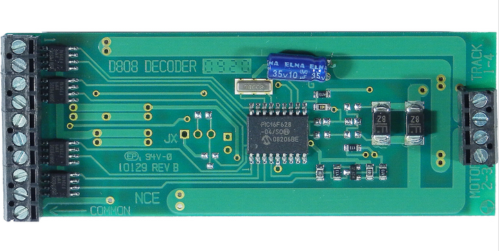 NCE 524-112 D808 decoder — close-up of the labeled circuit board and screw terminals.