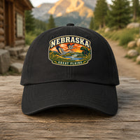 Nebraska heritage badge on a black embroidered dad hat outdoors