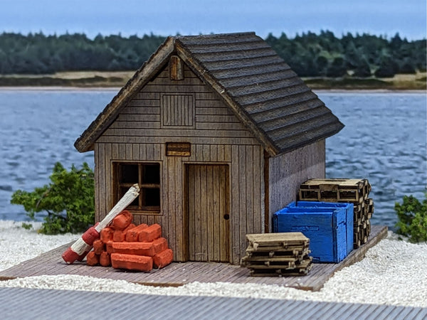 Assembled Osborn 1125 HO lobster fishing equipment shed with scenic accessories