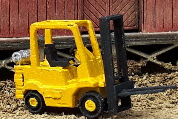 Painted and assembled example of Osborn 3128 N scale forklift; building and scenery not included