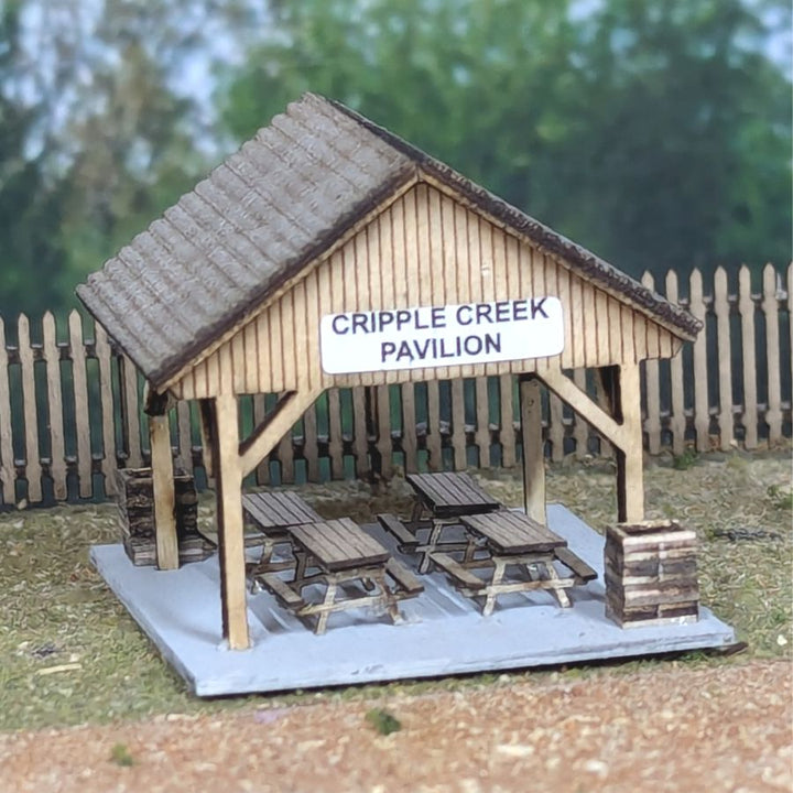 Completed Osborn 3142 N scale Cripple Creek Pavilion model in a landscaped example scene