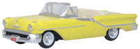 Oxford Diecast 87OC57001 1957 Oldsmobile 88 Convertible in Coronado Yellow with roof down, 1:87 scale model, front three-quarter view.