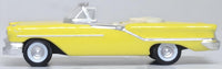 Oxford Diecast 87OC57001 1957 Oldsmobile 88 Convertible in Coronado Yellow with roof down, 1:87 scale model, left side view.