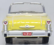 Oxford Diecast 87OC57001 1957 Oldsmobile 88 Convertible in Coronado Yellow with roof down, 1:87 scale model, rear view.