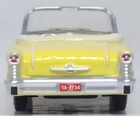 Oxford Diecast 87OC57001 1957 Oldsmobile 88 Convertible in Coronado Yellow with roof down, 1:87 scale model, rear view.