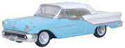 Oxford Diecast 87OC57002 1957 Oldsmobile 88 Convertible with roof up, Banff Blue and Alcan White, 1:87 scale model, front three-quarter view.