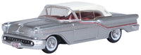 Oxford Diecast 87OC57003 1957 Oldsmobile 88 Convertible with closed white roof, Juneau Gray and red accents, 1:87 scale model, front three-quarter view.
