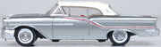 Oxford Diecast 87OC57003 1957 Oldsmobile 88 Convertible with closed white roof, Juneau Gray and red accents, 1:87 scale model, left side view.