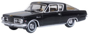 Oxford Diecast 87PB65004 1965 Plymouth Barracuda in Black and Gold, 1:87 scale model, front three-quarter view.