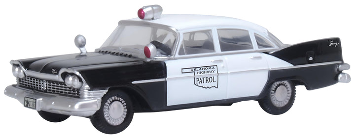 Oxford Diecast 87PS59001 1959 Plymouth Savoy Sedan Oklahoma Highway Patrol, 1:87 scale model, front three-quarter view.