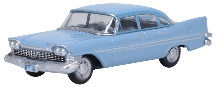 Oxford Diecast 87PS59003 1959 Plymouth Savoy Sedan in Powder Blue, 1:87 scale model, front three-quarter view.
