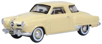 Oxford Diecast 87SC50001 1950 Studebaker Champion Starlight Coupe in Tulip Cream, 1:87 scale model, front three-quarter view.