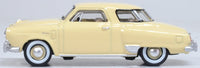 Oxford Diecast 87SC50001 1950 Studebaker Champion Starlight Coupe in Tulip Cream, 1:87 scale model, left side view.