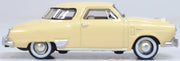 Oxford Diecast 87SC50001 1950 Studebaker Champion Starlight Coupe in Tulip Cream, 1:87 scale model, right side view.