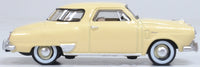 Oxford Diecast 87SC50001 1950 Studebaker Champion Starlight Coupe in Tulip Cream, 1:87 scale model, right side view.