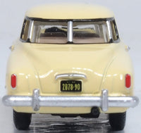 Oxford Diecast 87SC50001 1950 Studebaker Champion Starlight Coupe in Tulip Cream, 1:87 scale model, rear view.