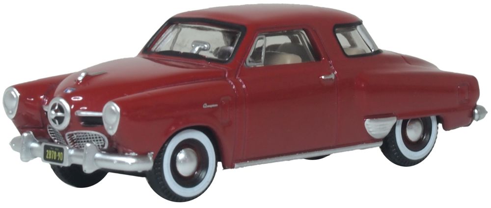 Oxford Diecast 87SC50003 1950 Studebaker Champion Starlight Coupe in Commanche Red, 1:87 scale model, front three-quarter view.